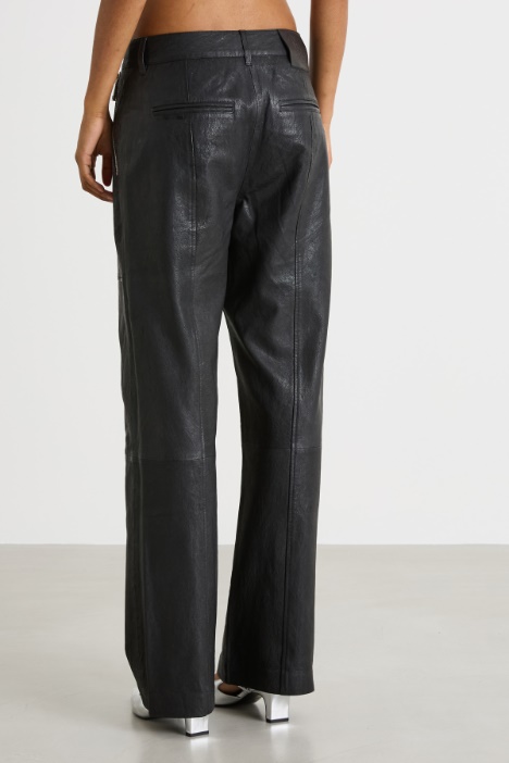 Pantaloni con tasche e impunture