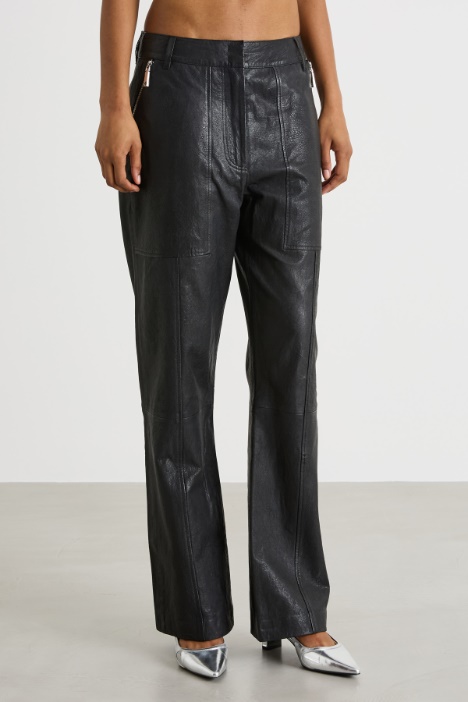 Pantaloni con tasche e impunture