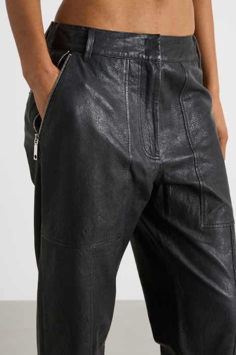 Pantaloni con tasche e impunture