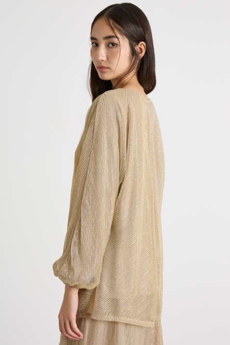 Top in tessuto laminato