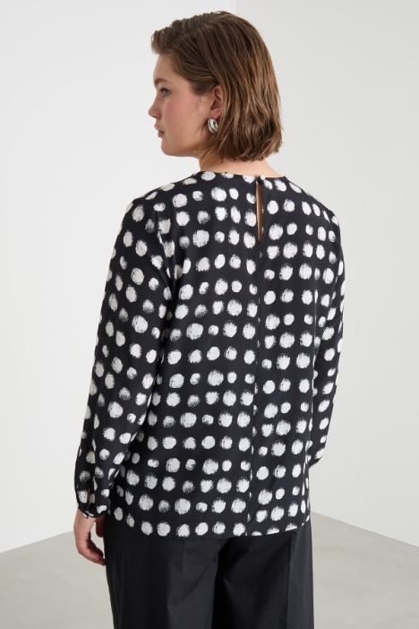 Blusa con apertura a goccia