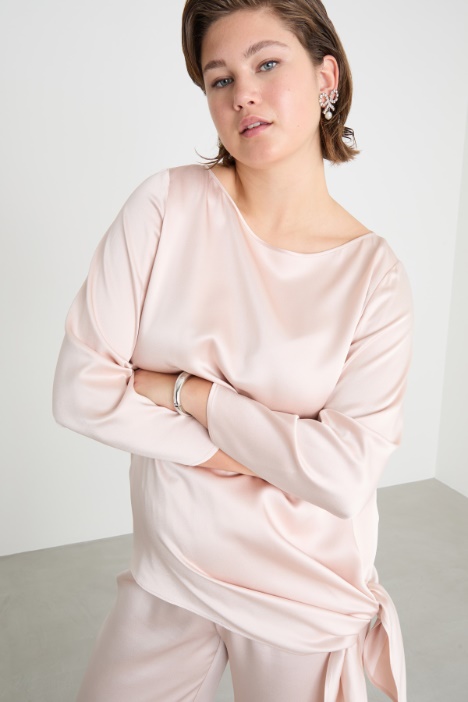 Blusa con nodo laterale