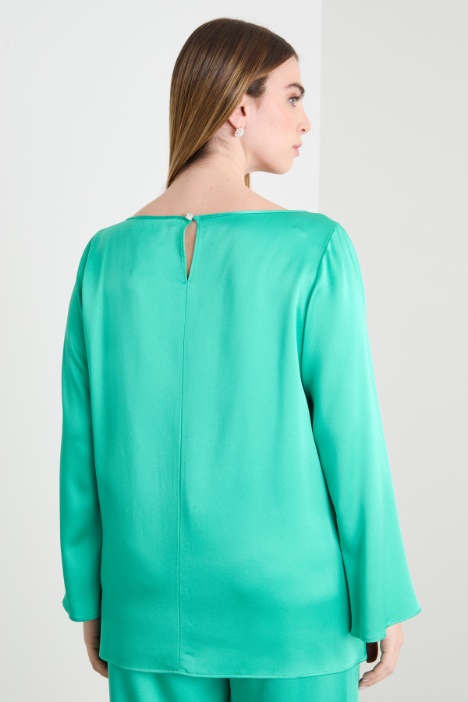 Blusa con nodo laterale
