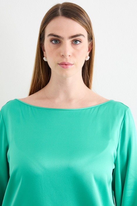 Blusa con nodo laterale