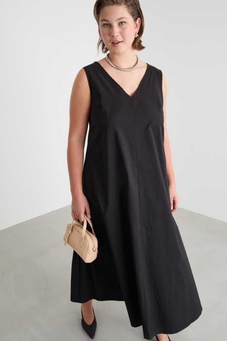 Abito svasato con balze posteriori