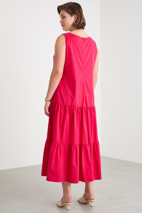 Abito svasato con balze posteriori