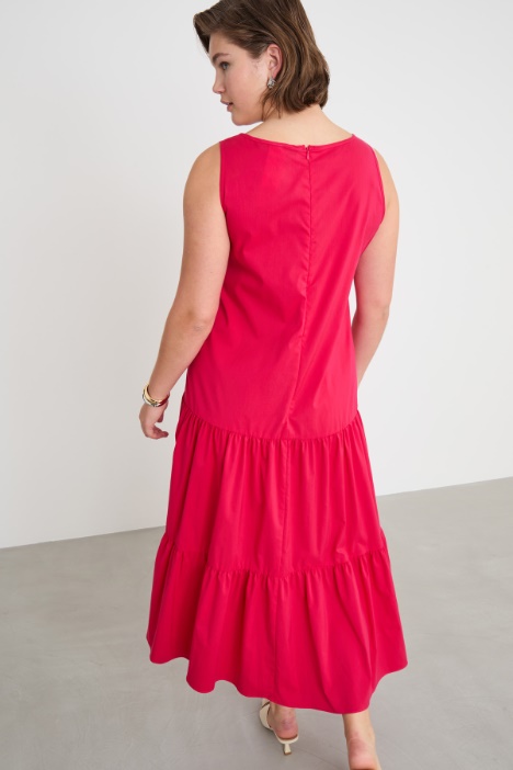 Abito svasato con balze posteriori