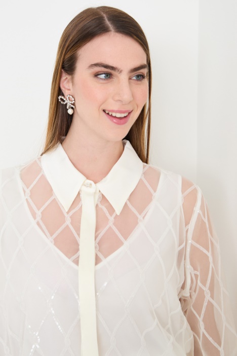 Blusa in organza ricamata
