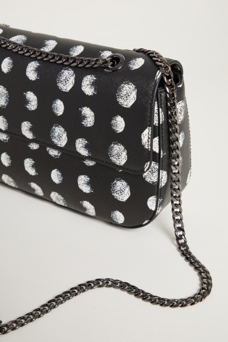 Bolso de tejido recubierto con estampado de lunares