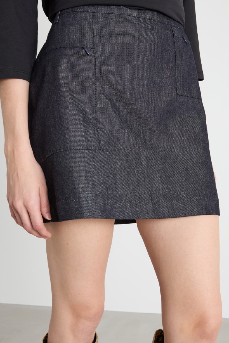 Minigonna con tasche asimmetriche