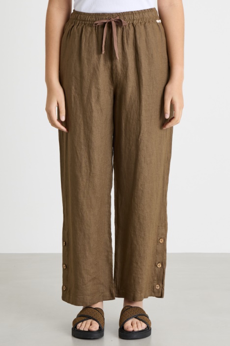 Pantalone con bottoni al fondo