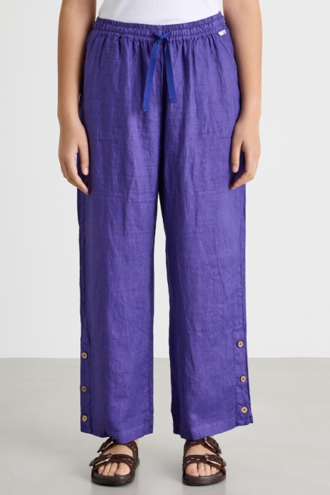 Pantalone con bottoni al fondo