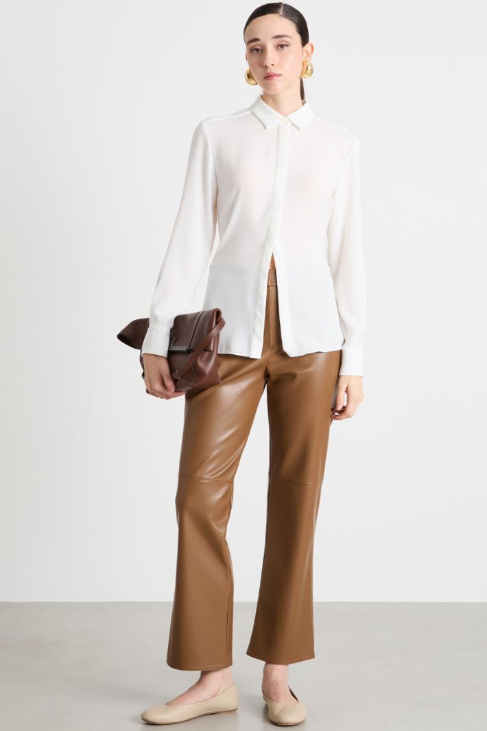 Slim-fit coated trousers Intrend