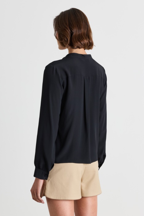 Blusa con scollo a V