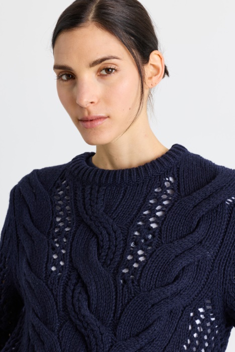 Maglia traforata a trecce