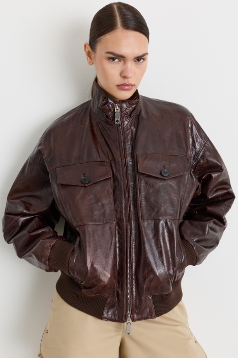 Bomber glossy con tasche