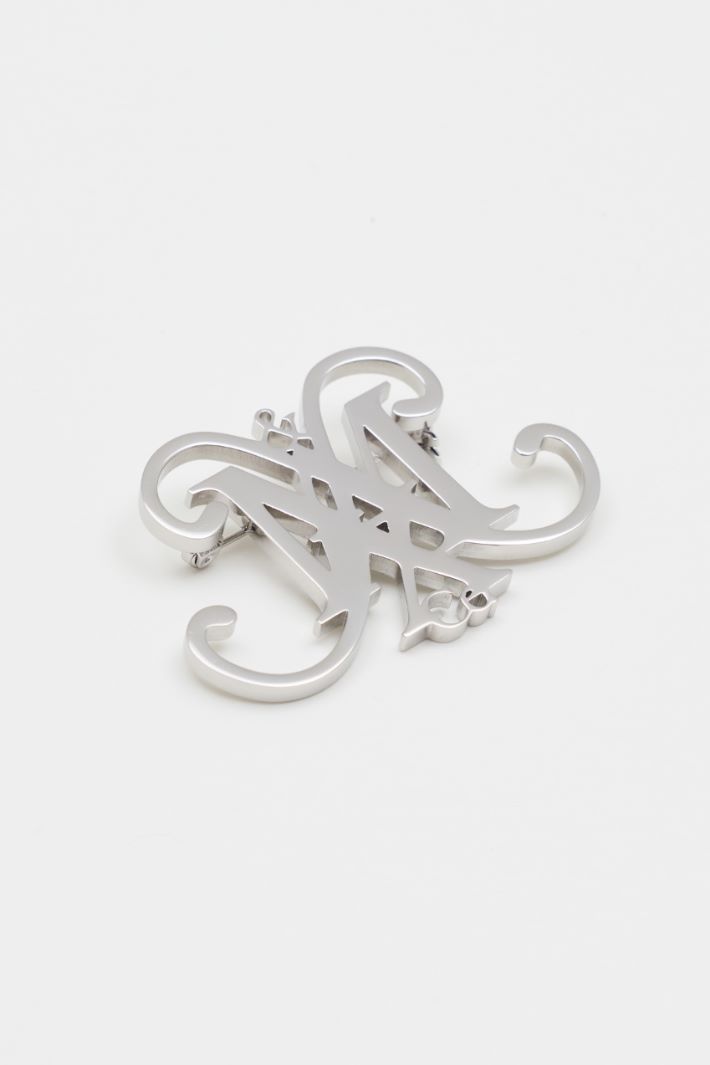 Pin metálico con emblema - PLATA - Intrend