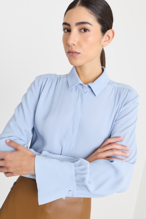 Blusa con fiocco