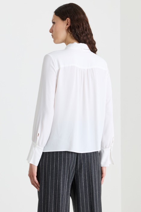 Blusa con fiocco