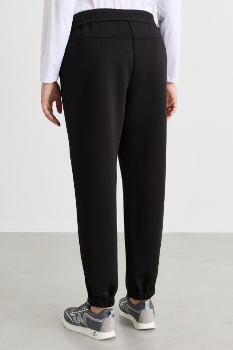 Pantaloni con passamaneria a rete