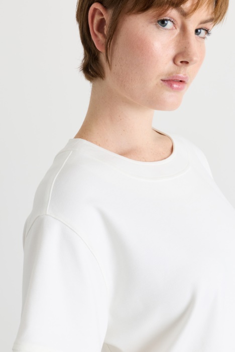 Top in jersey con zip